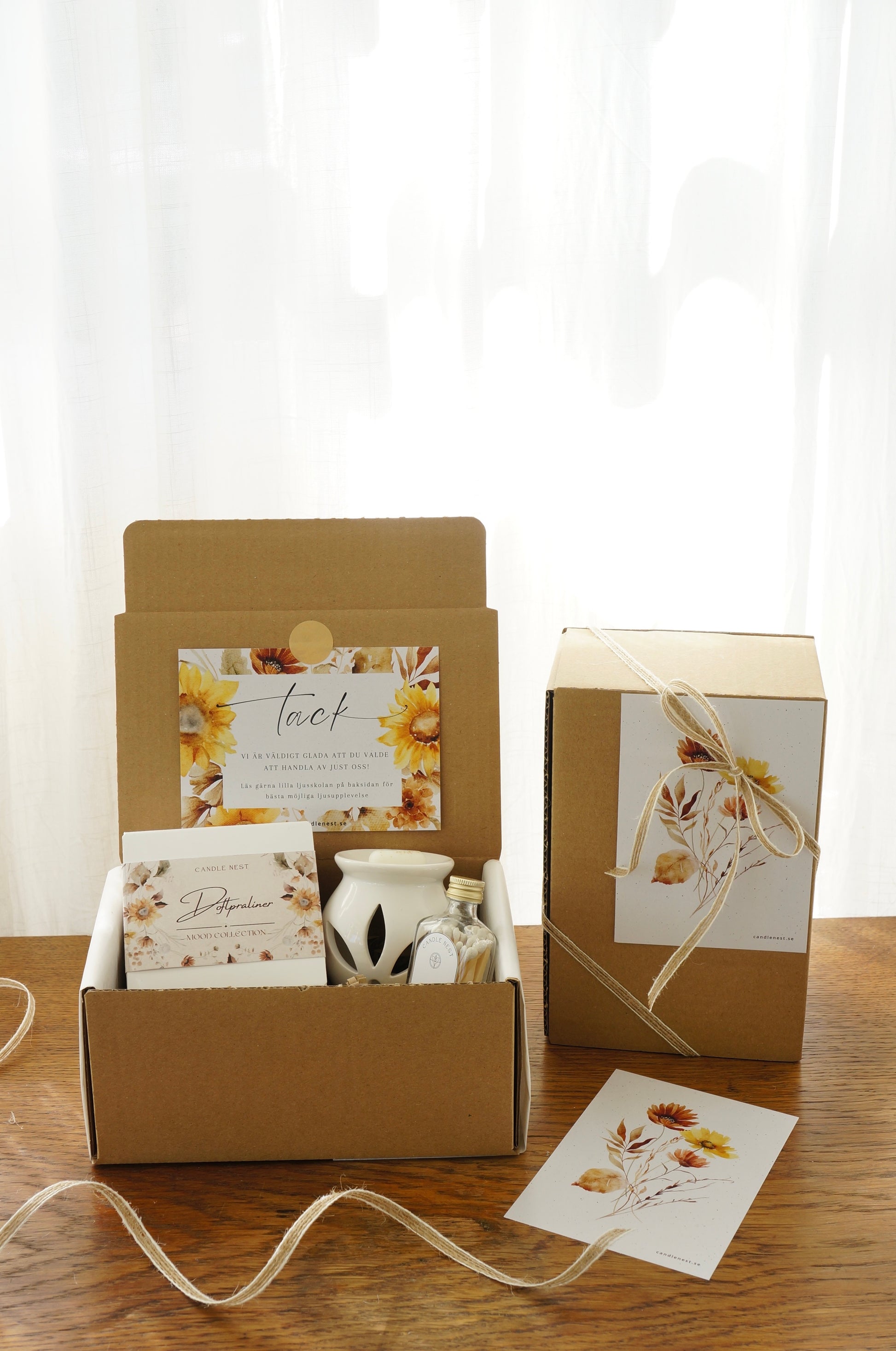 Presentbox med Doftpraliner, aromalampa och flaska med tändstickor