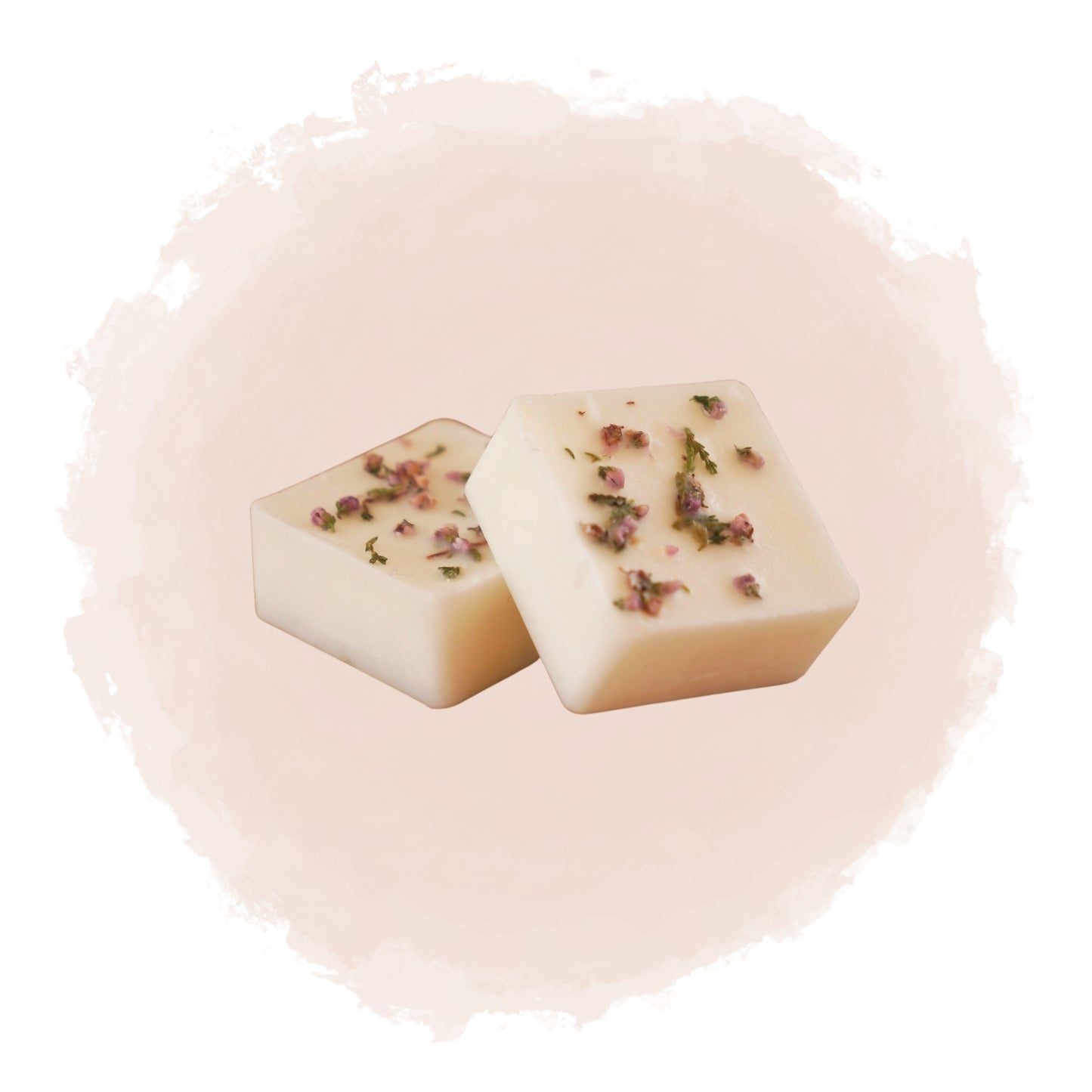 Kubisk doftprov med torkade lila blommor inbäddade i vitt vax
